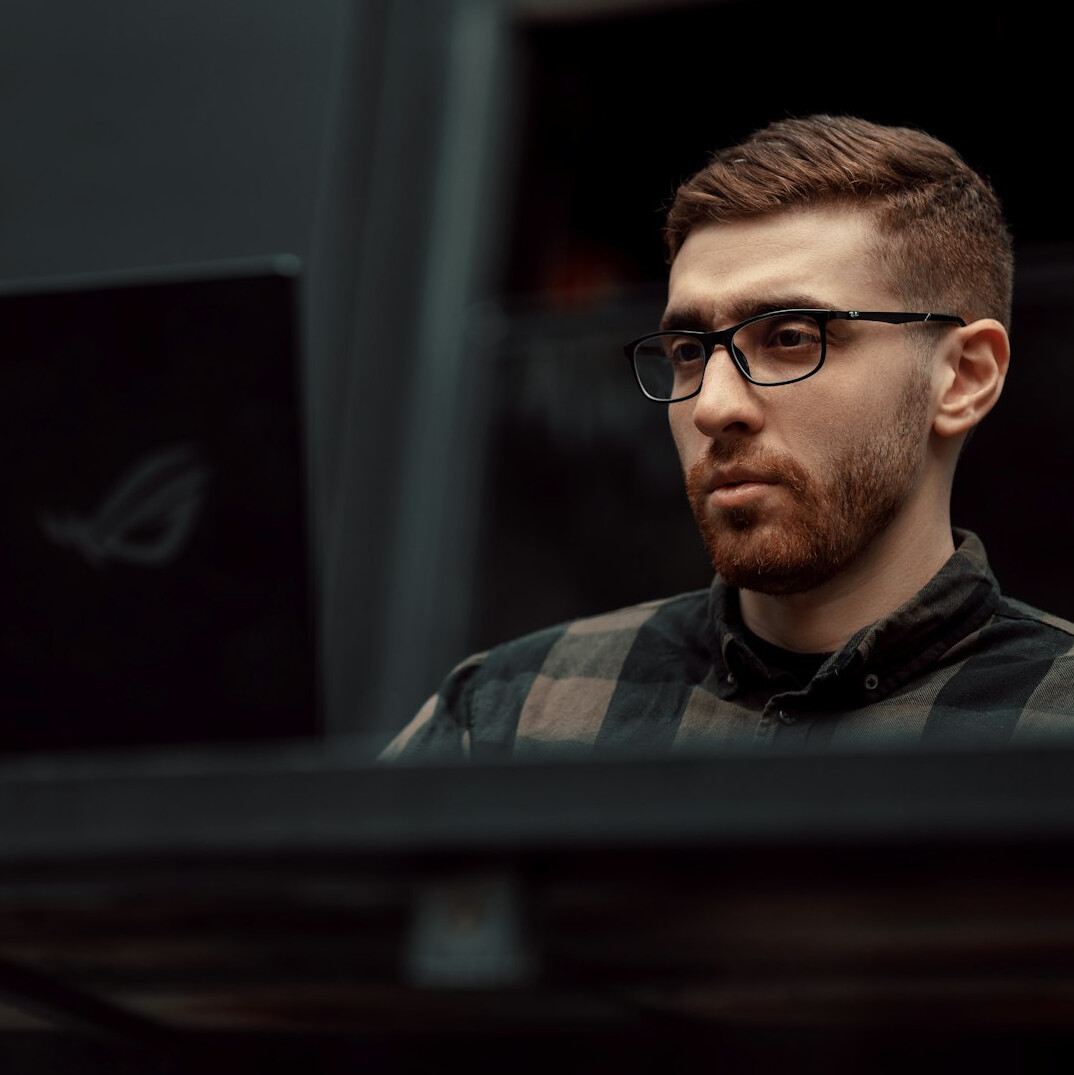 programmer working on laptop