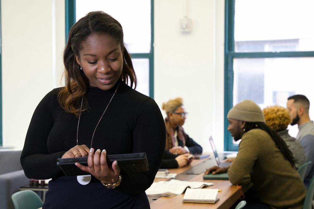 woman teaching coding class