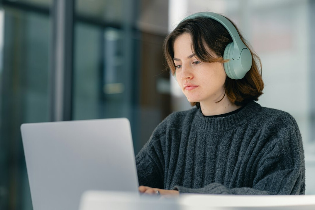 woman taking online course