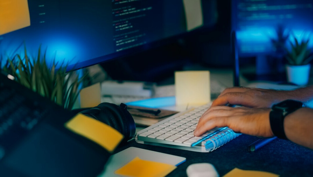 developer coding at desk