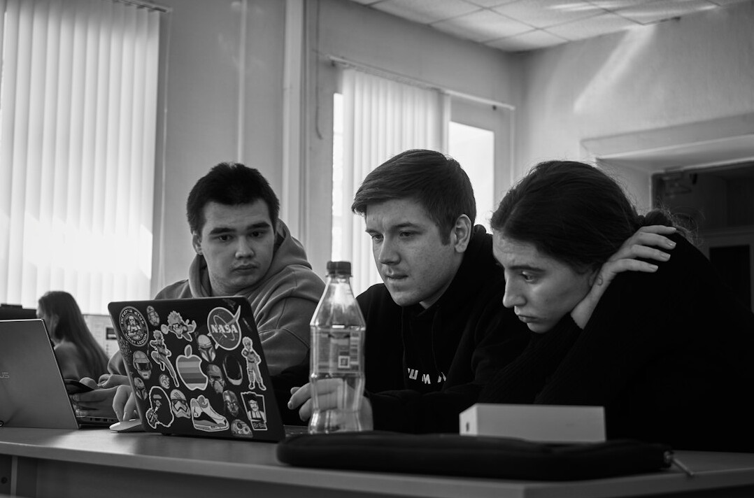 group of students coding